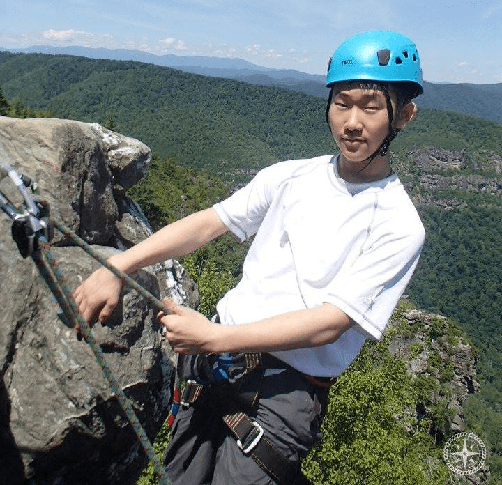 Ian Rock Climbing with NCOBS